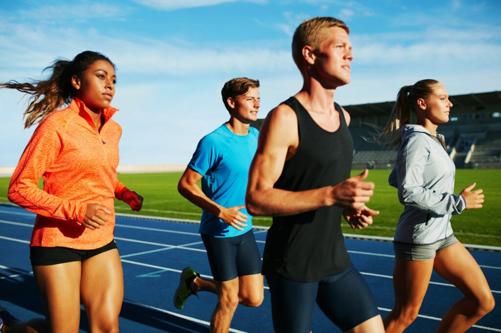 group of multiracial professional runners practicing.jpg
